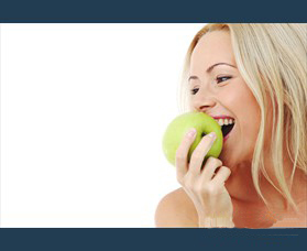 bigstock-blond-woman-eat-green-apple-12517646